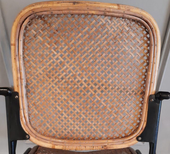 1950s chair in black metal and braided rattan