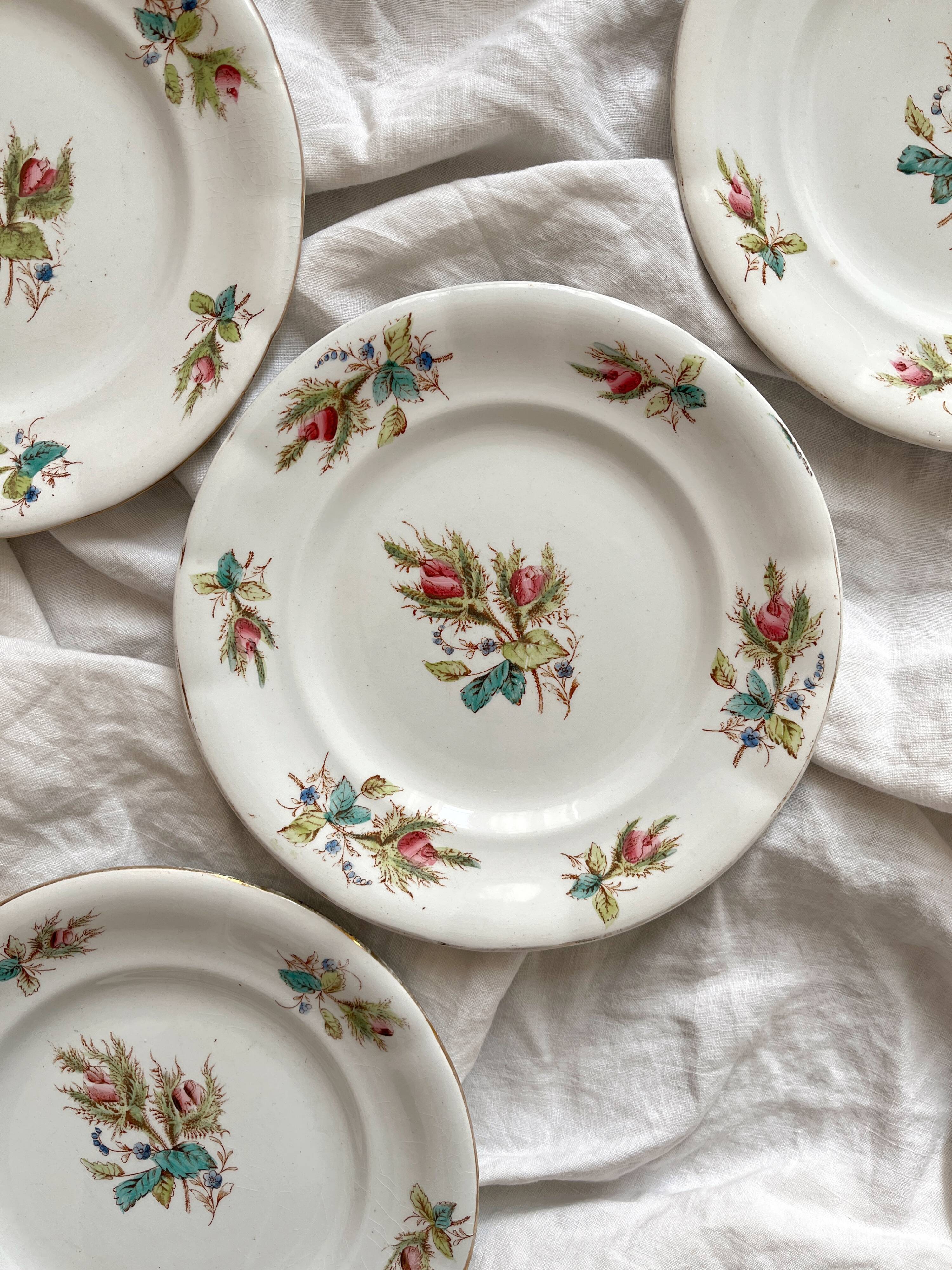 4 polychrome ironstone dessert plates with flowers, KG Lunéville