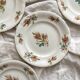 4 polychrome ironstone dessert plates with flowers, KG Lunéville