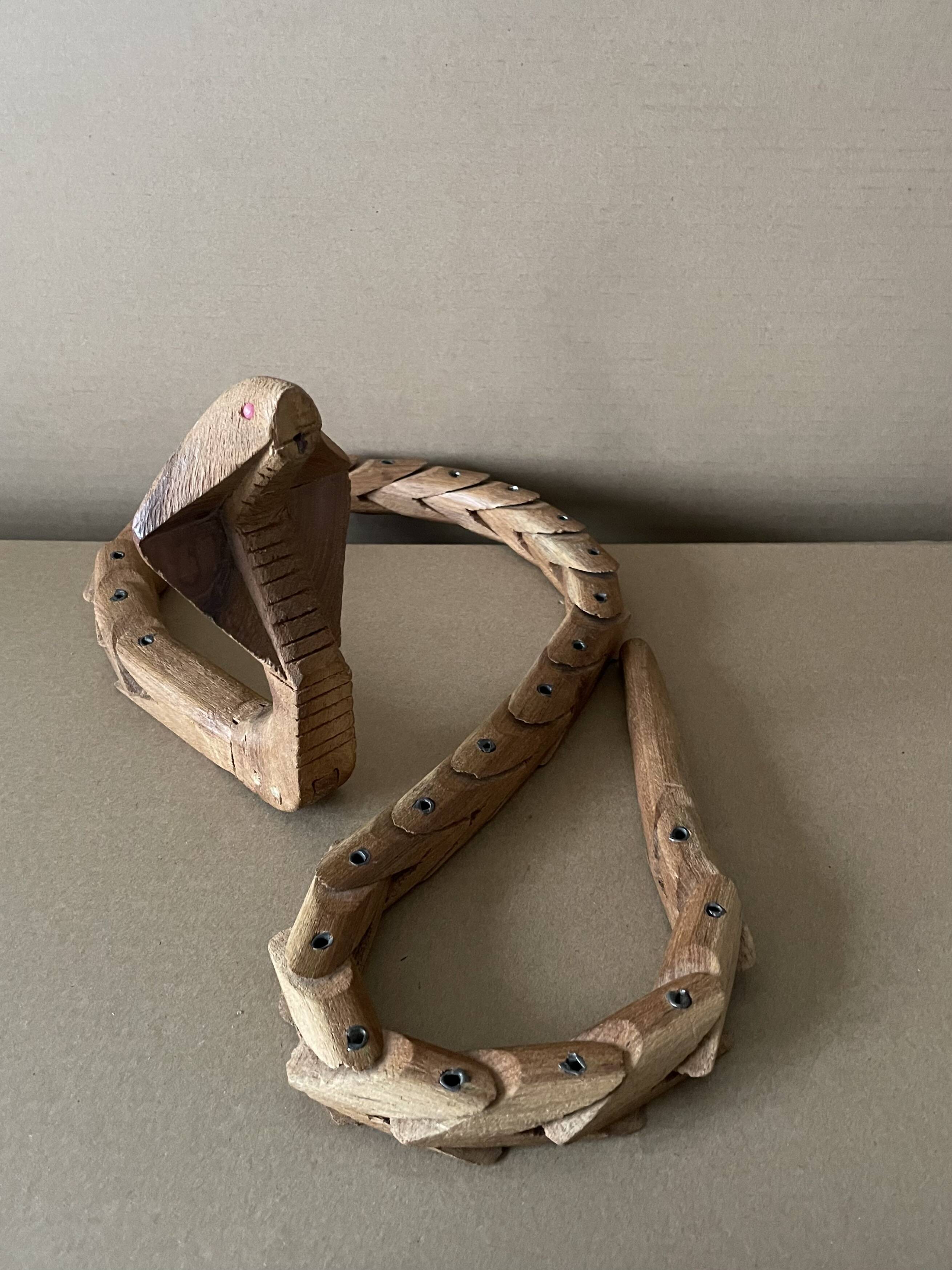 Articulated wooden snake
