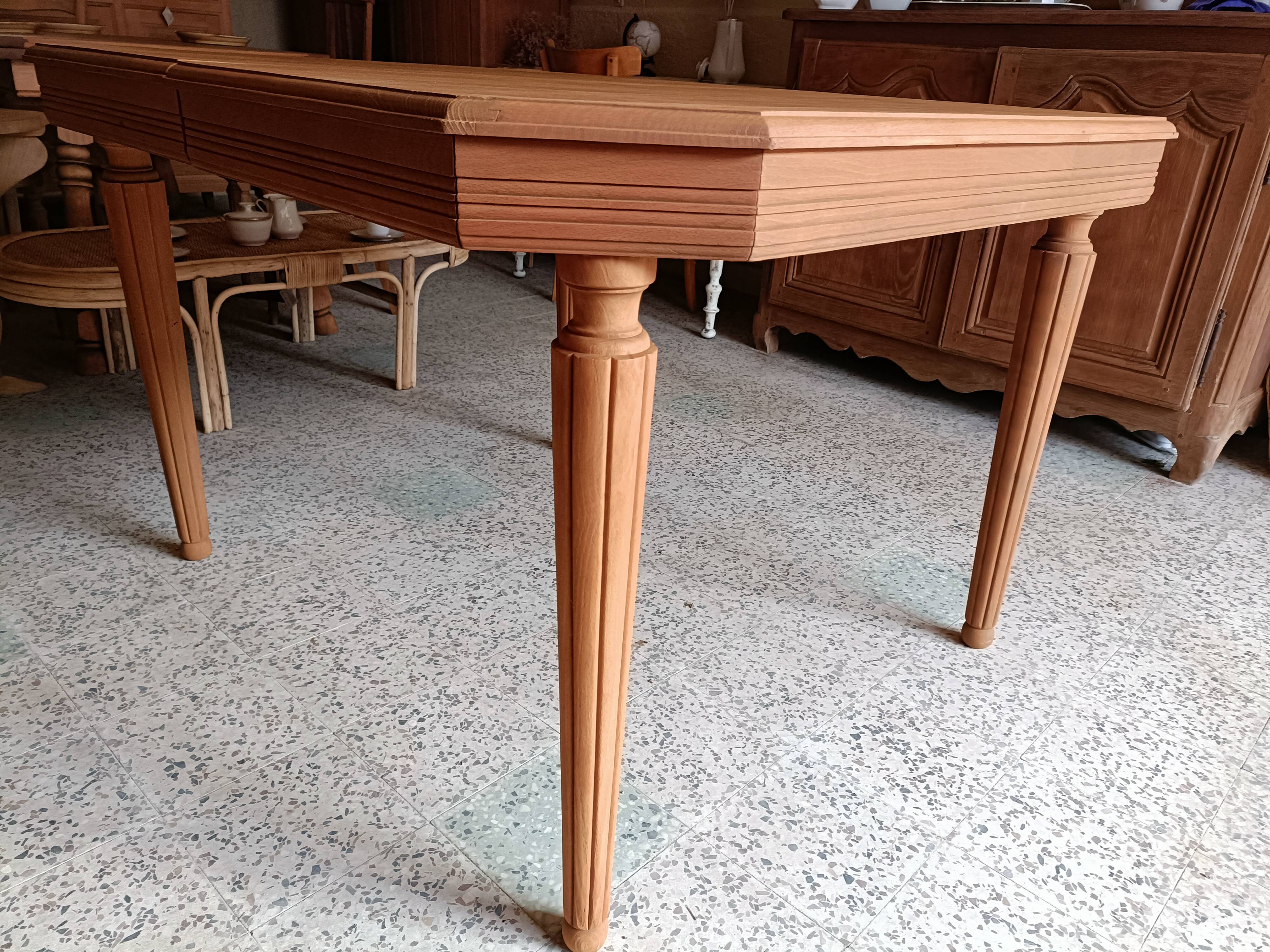 Renovated Art Deco table with 3 extensions.