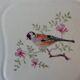 Trivet and bottle holder Salin, 1950s. Bird on branch.