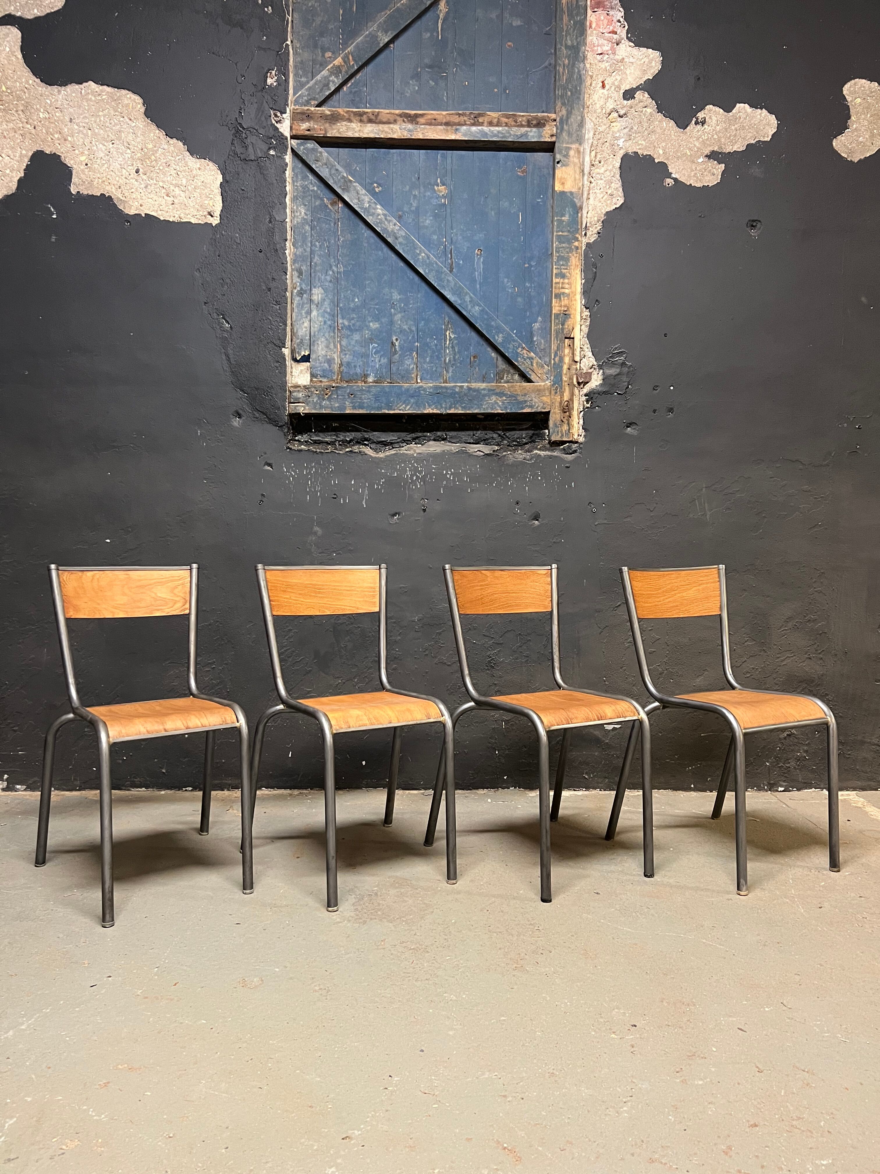 Set of Mulca school chairs patinated graphite.