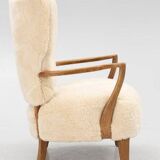 Danish armchair. upholstered with Australian lambskin. Danish Cabinmaker, 1940's