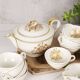 Porcelain tea service by Théodore Haviland, gilded patterns.