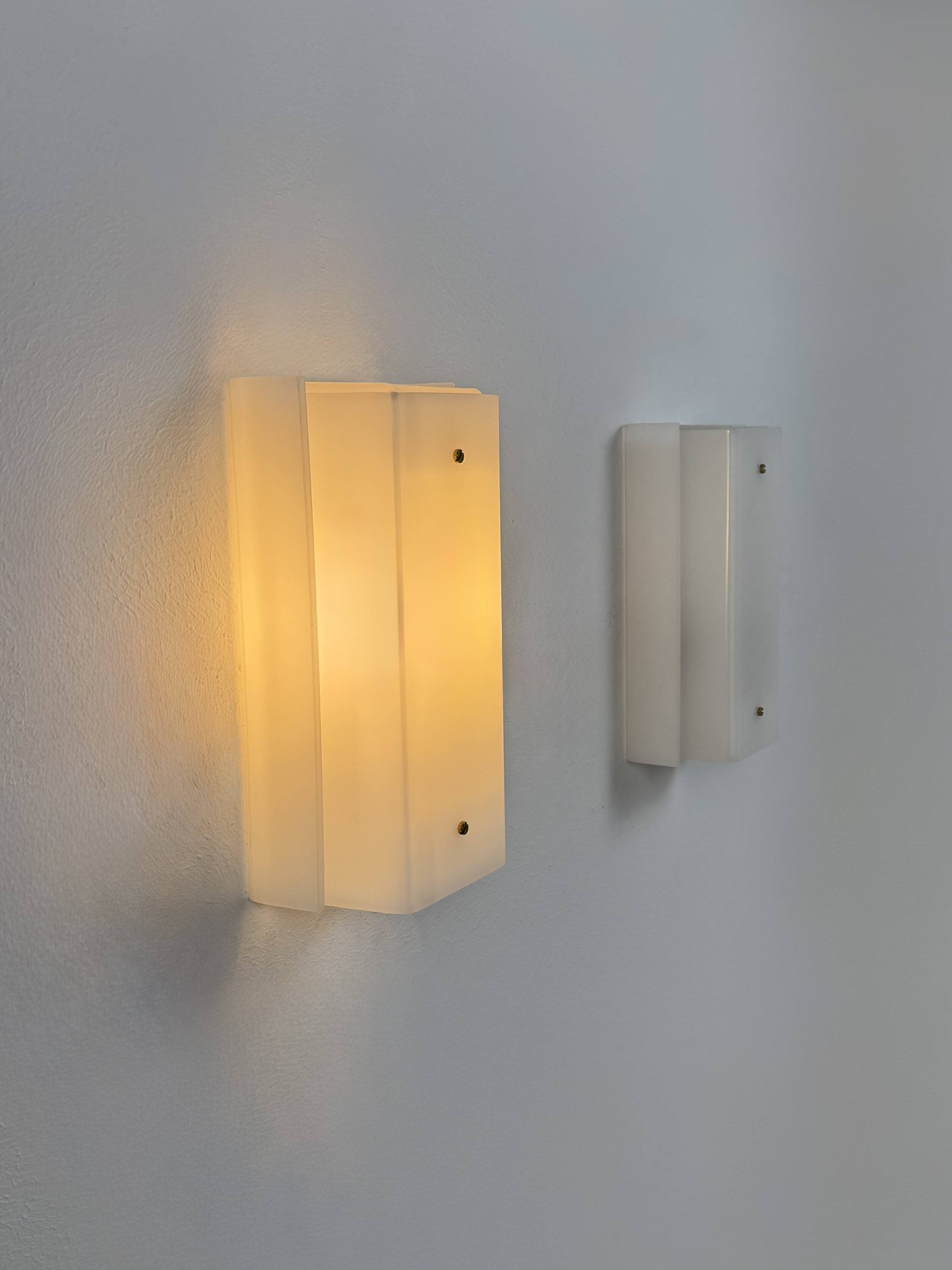 Pair of vintage Perspex wall lights, Italy, 1970.