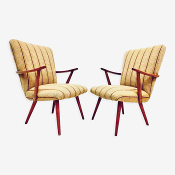 A pair vintage cocktail chairs with stripes and metal screws