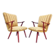A pair vintage cocktail chairs with stripes and metal screws