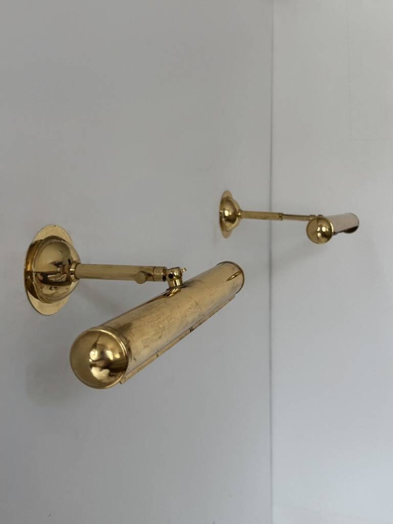 Pair of adjustable vintage brass wall lights, France, 1970.