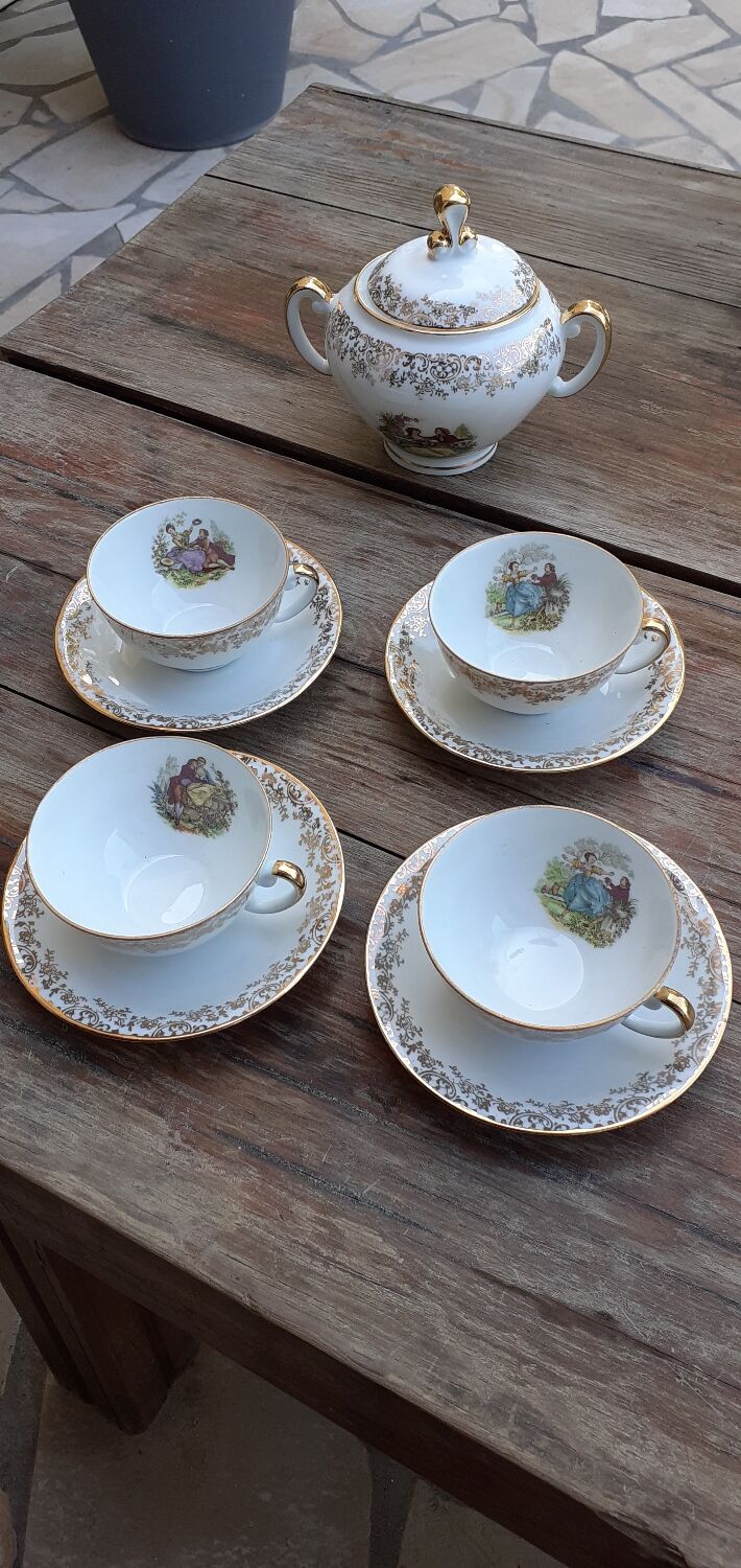 Set of 4 cups and sugar bowl Haute porcelaine de Berry