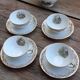 Set of 4 cups and sugar bowl Haute porcelaine de Berry