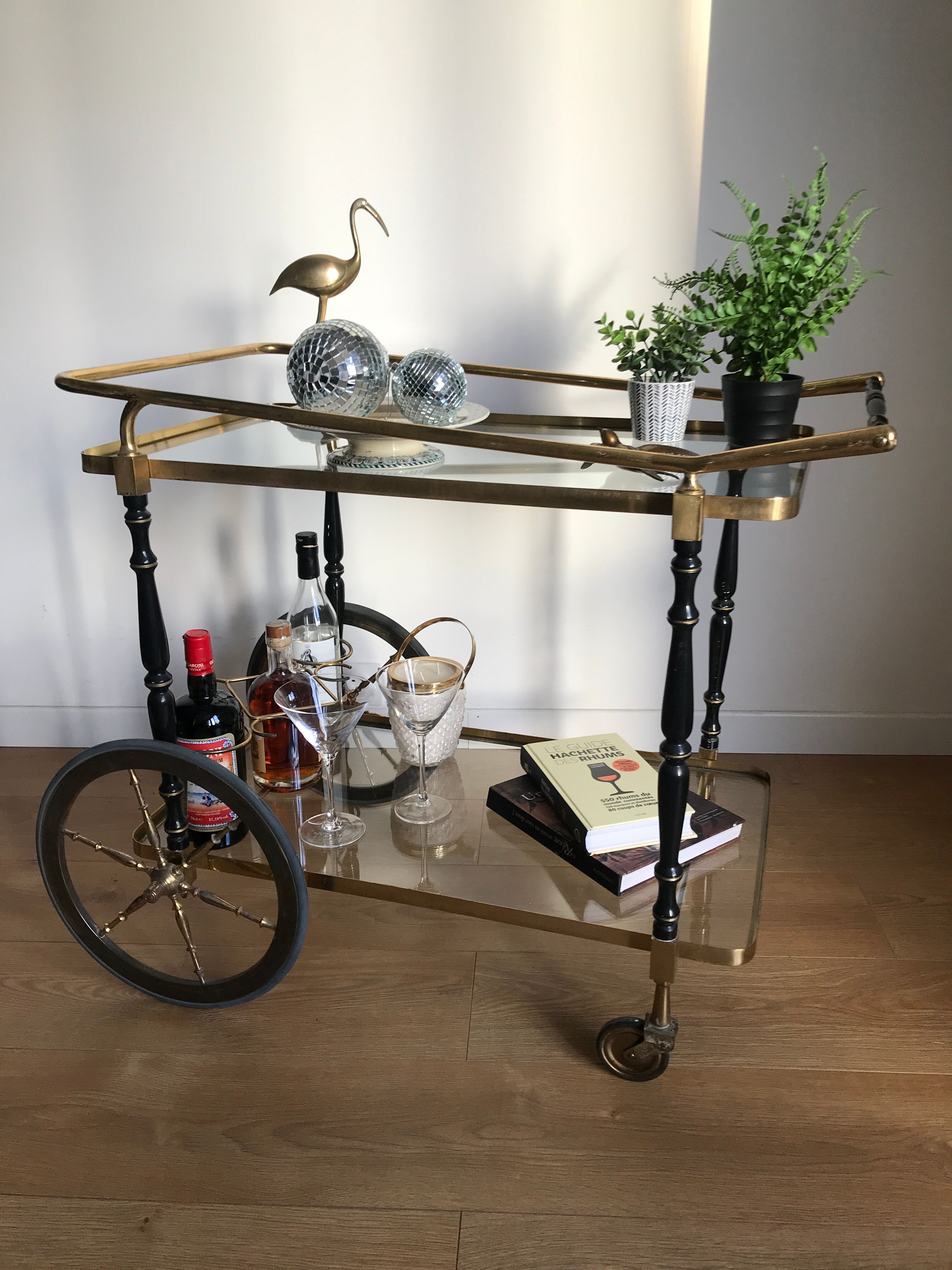 Vintage rolling golden and black dessert in brass and glass