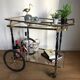 Vintage rolling golden and black dessert in brass and glass