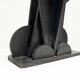 Black brutalist wooden sculpture