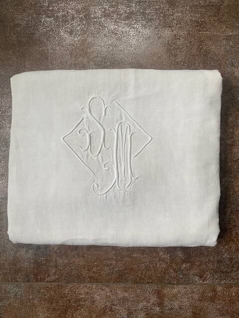 Antique cotton and linen sheet monogrammed M B with Venice lace