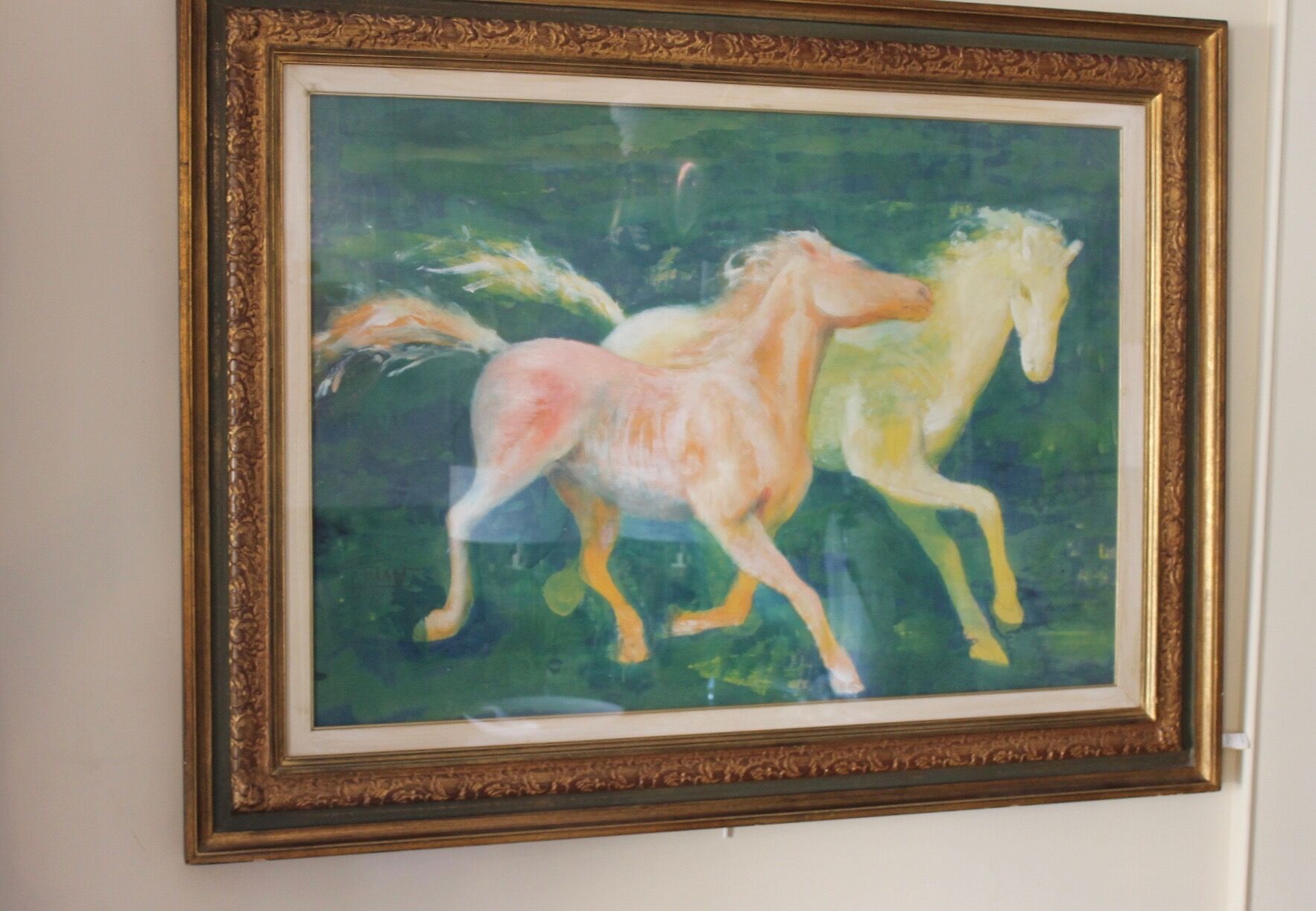 Framed painting representing horses, signed, XX th