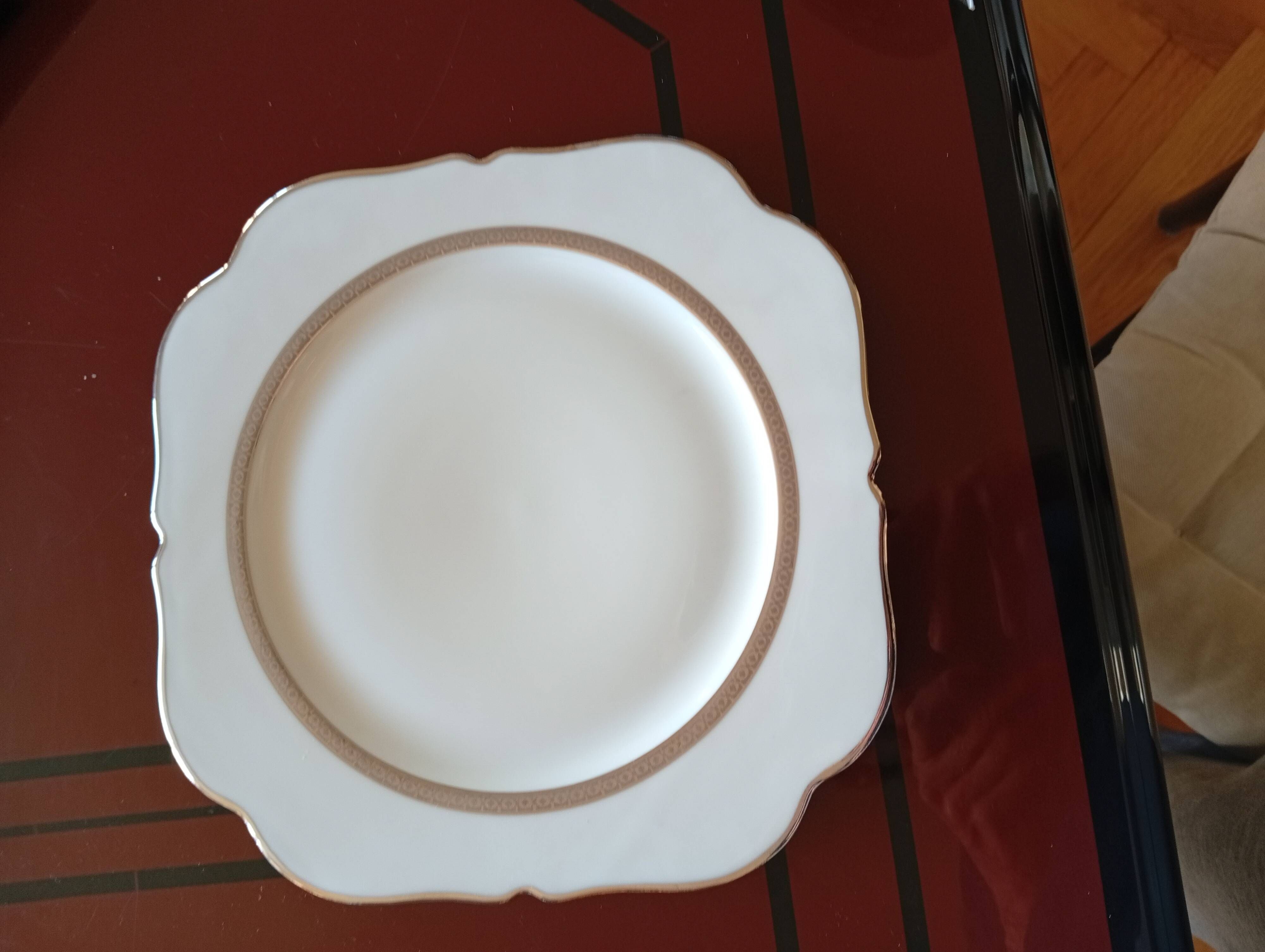 Jean BOYER Limoges FRANCE part of a white porcelain table service.