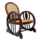 Art Deco armchairs in wood, with cane seat and backrest, circa 1930.
