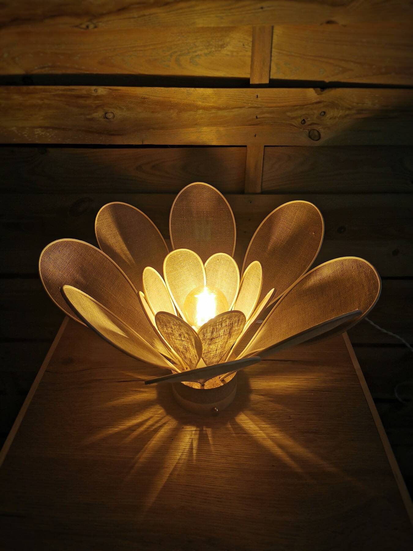 Flower table lamp made of rattan and natural linen petals