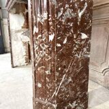 Red marble fireplace in the Louis XVI style, late 19th century