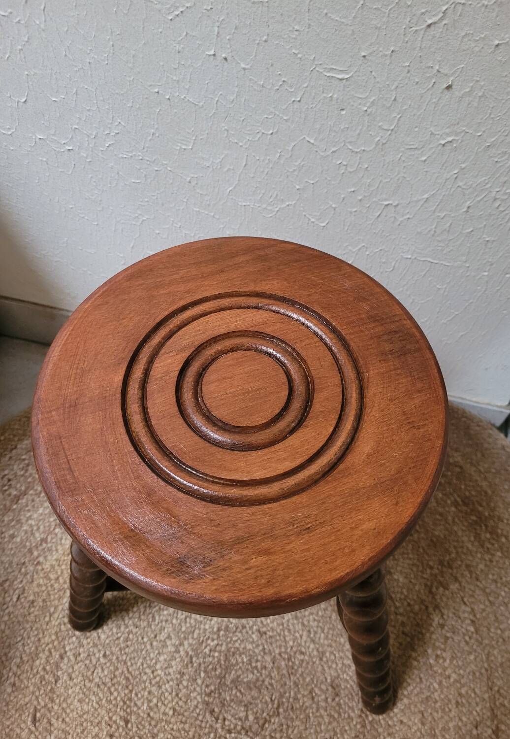 Tripod stool with turned legs