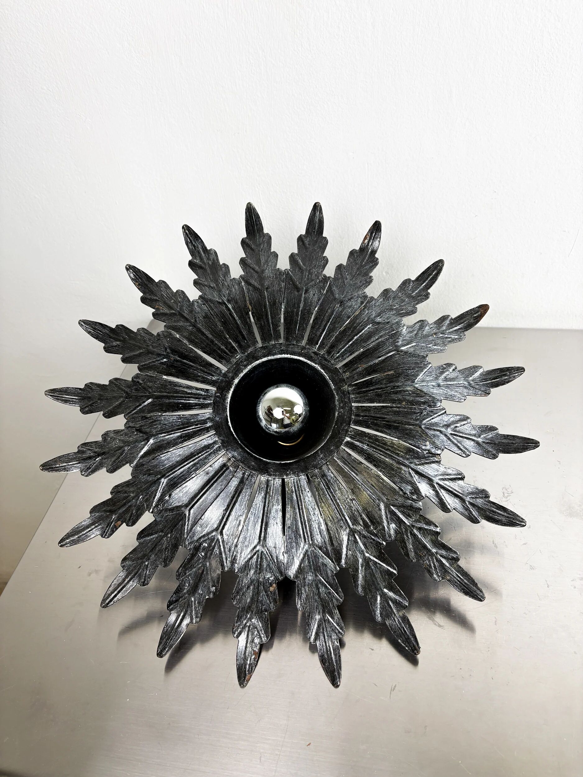 Spanish sunburst ceiling light – dark gilt metal rays, 1950s