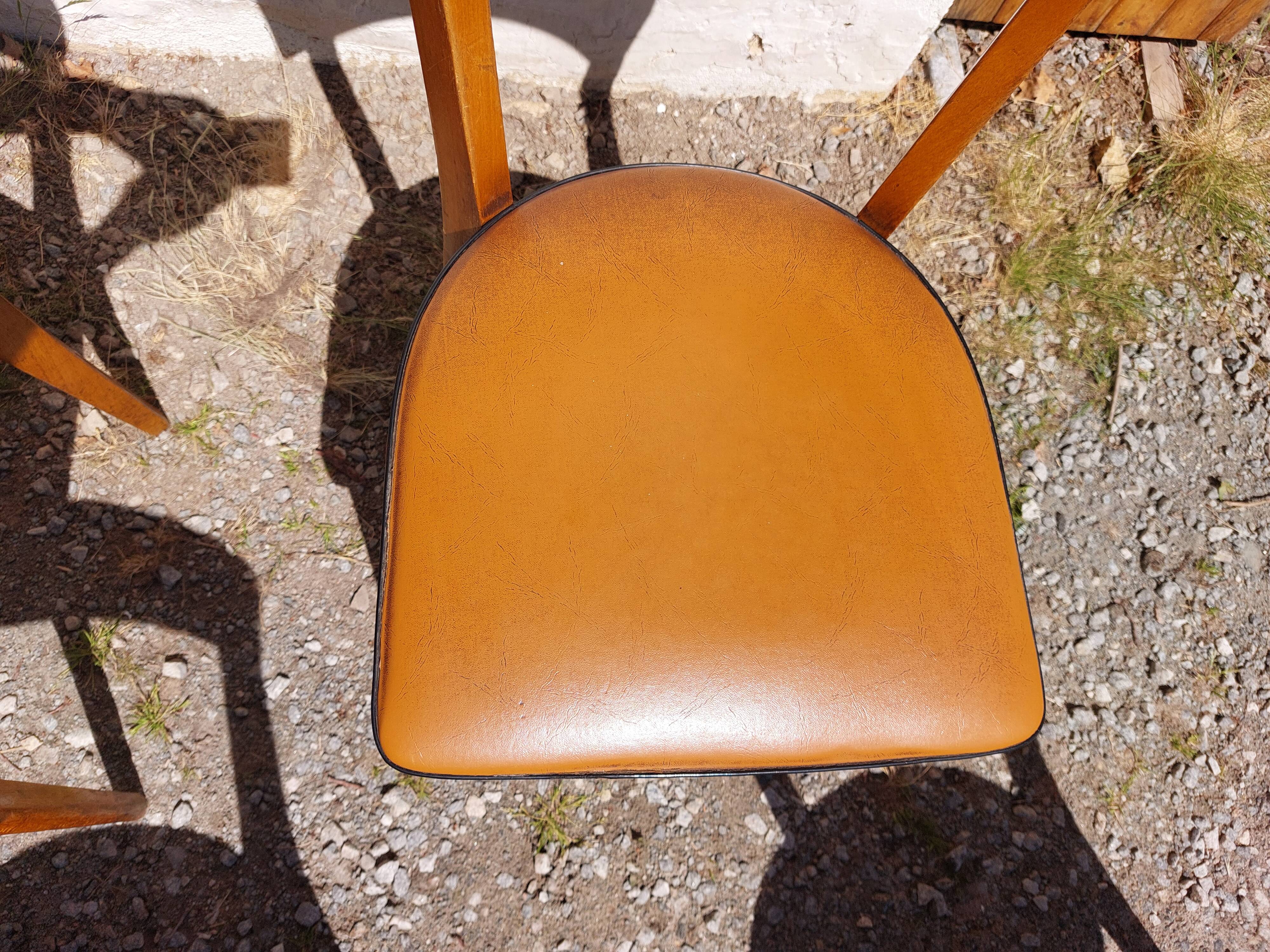 6 vintage 1960s wooden bistro chairs with camel faux leather.
