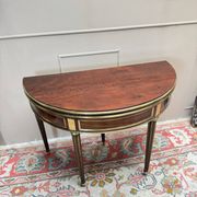 Half-moon table in mahogany from the Louis XVI period, 18th century.