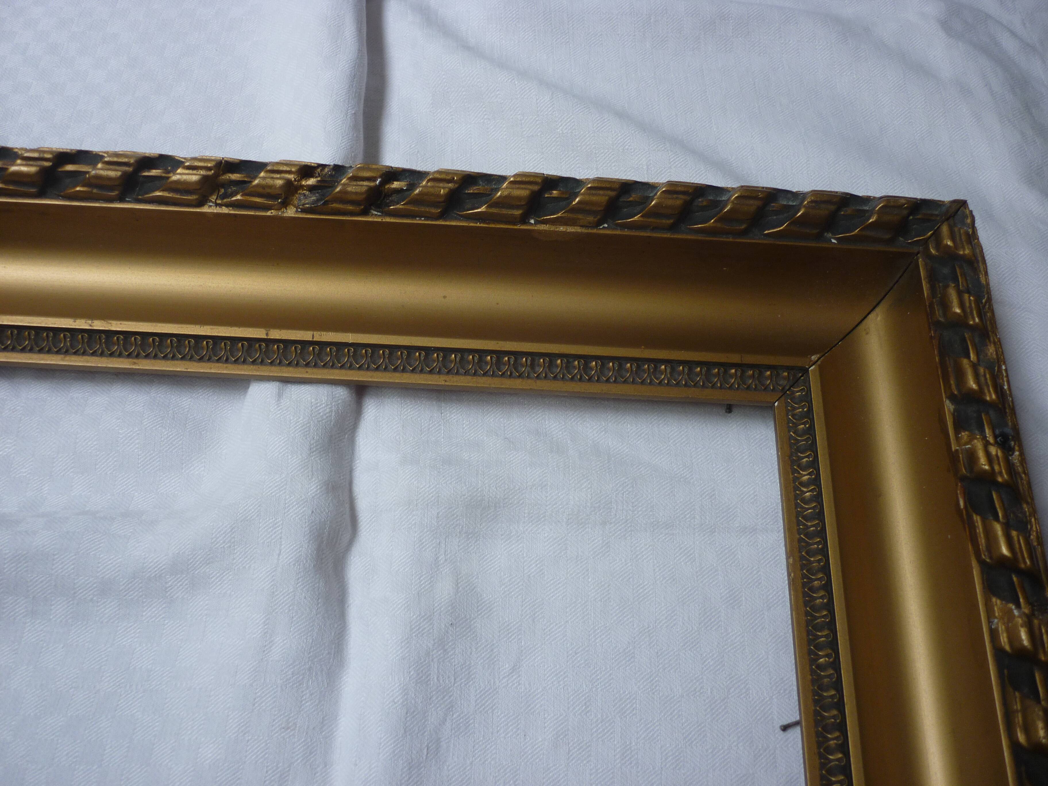 Gilded wood and stucco frame
