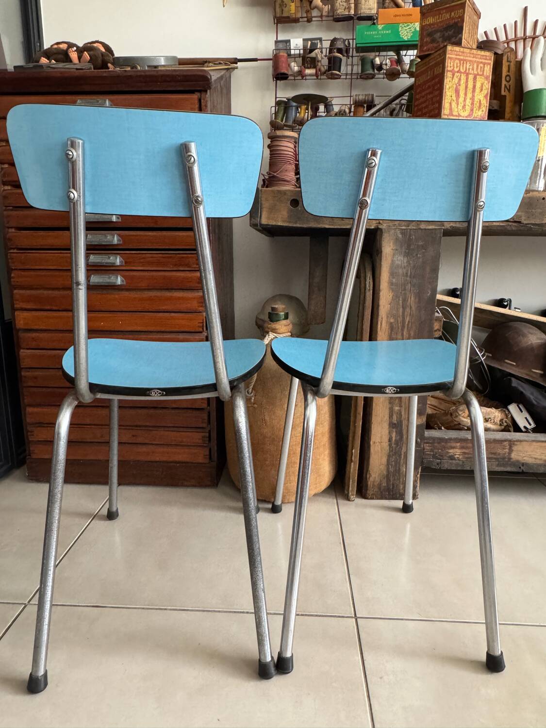 Pair of vintage blue Formica chairs