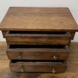 19th century Empire style walnut chest of drawers. It opens with 3 drawers in