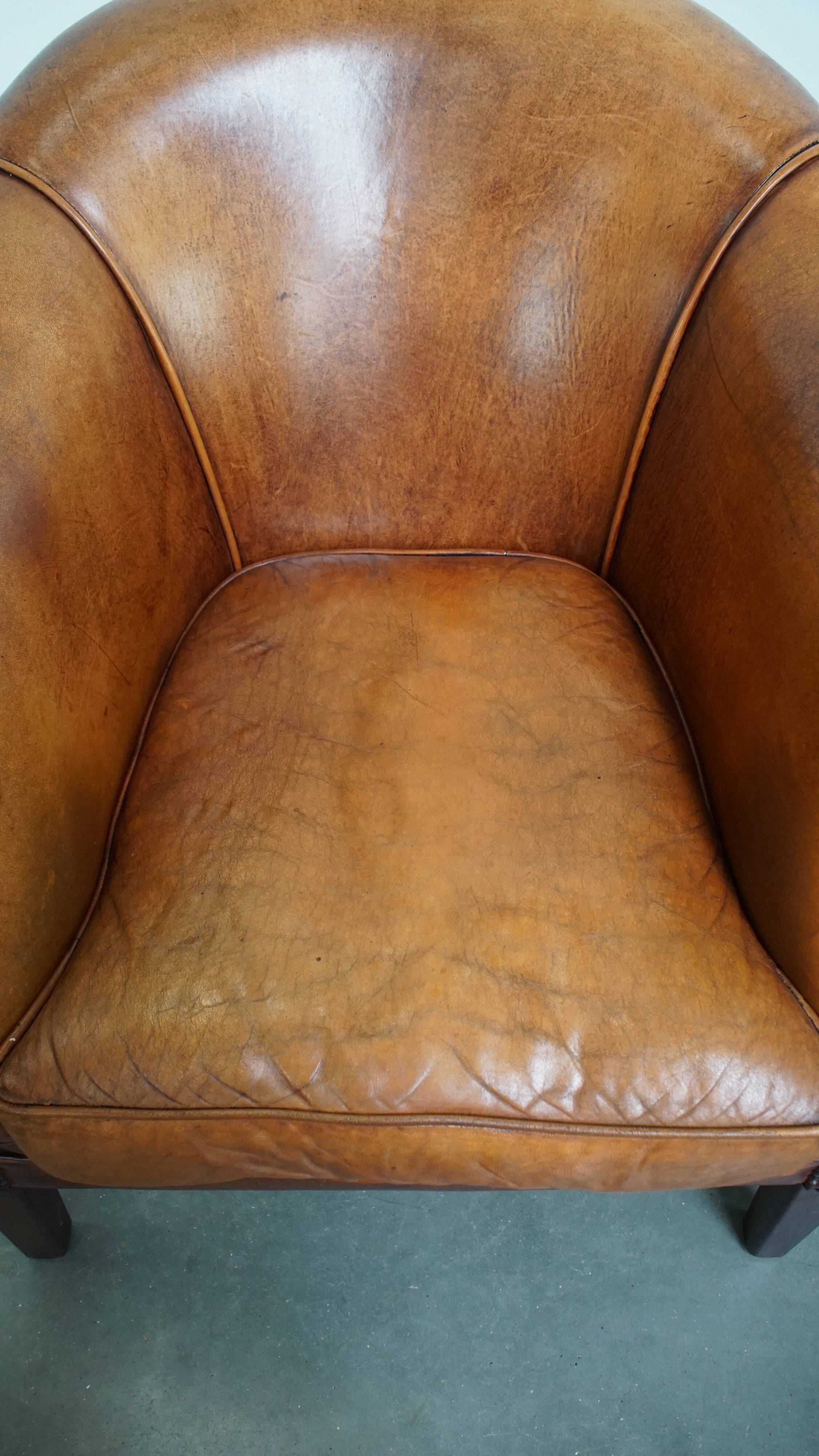 Set of 2 club chairs made of sheepskin leather
