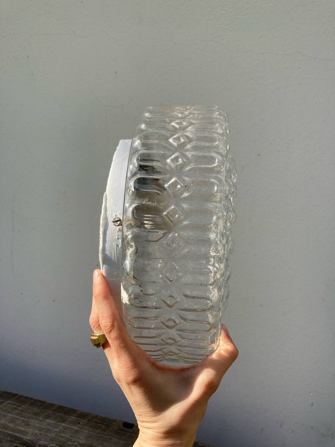 Pair of transparent round glass wall lights