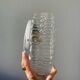 Pair of transparent round glass wall lights