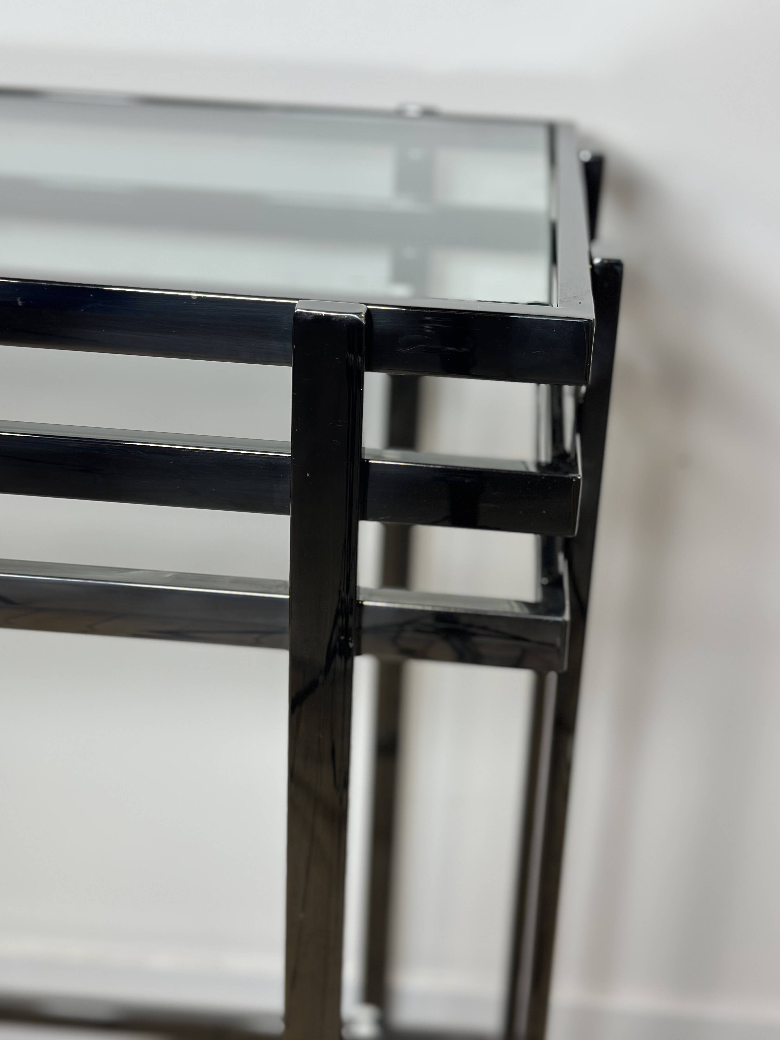 Smoked silver metal console from the 2000s.