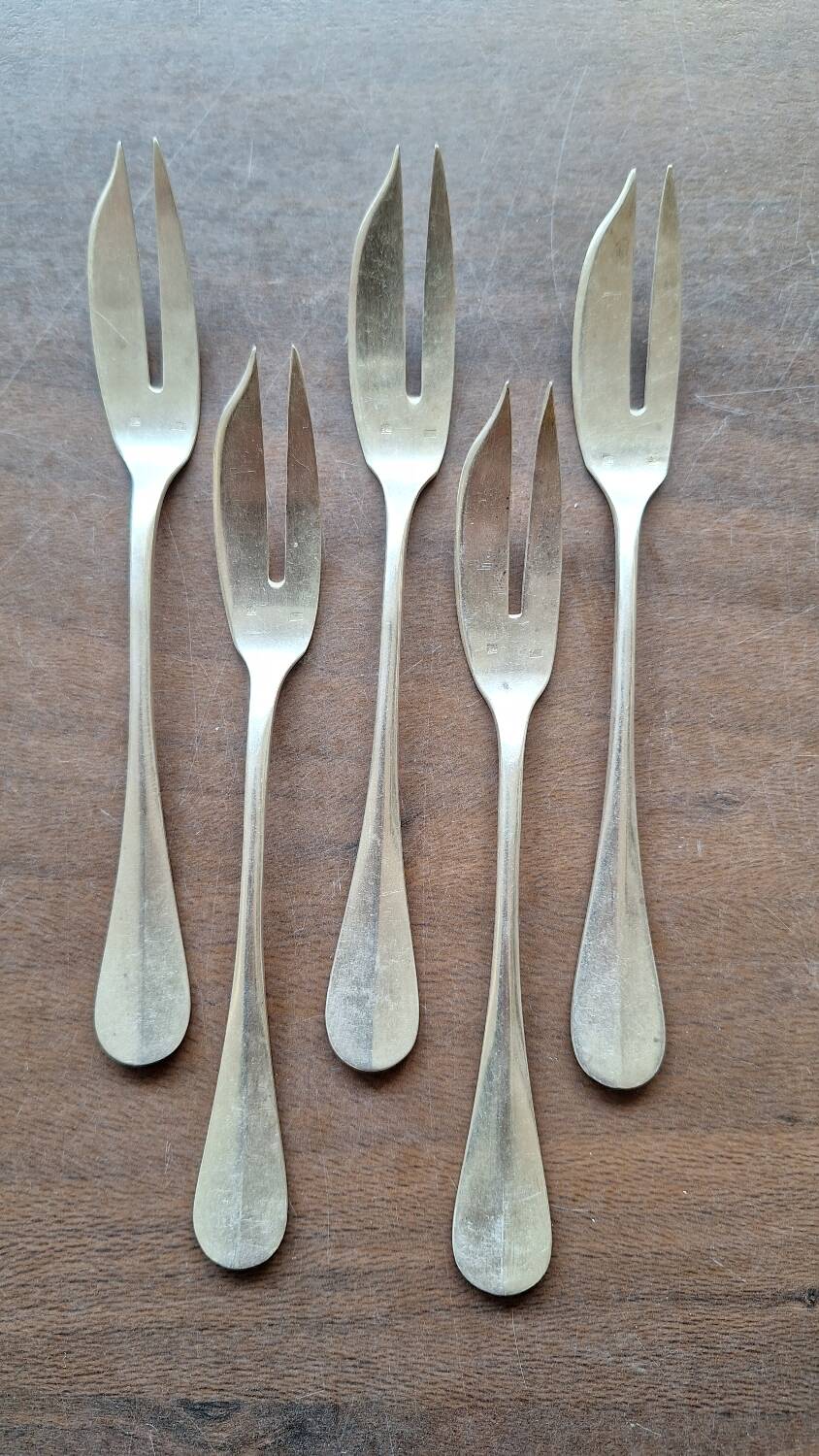 Set of 5 silver metal cake forks