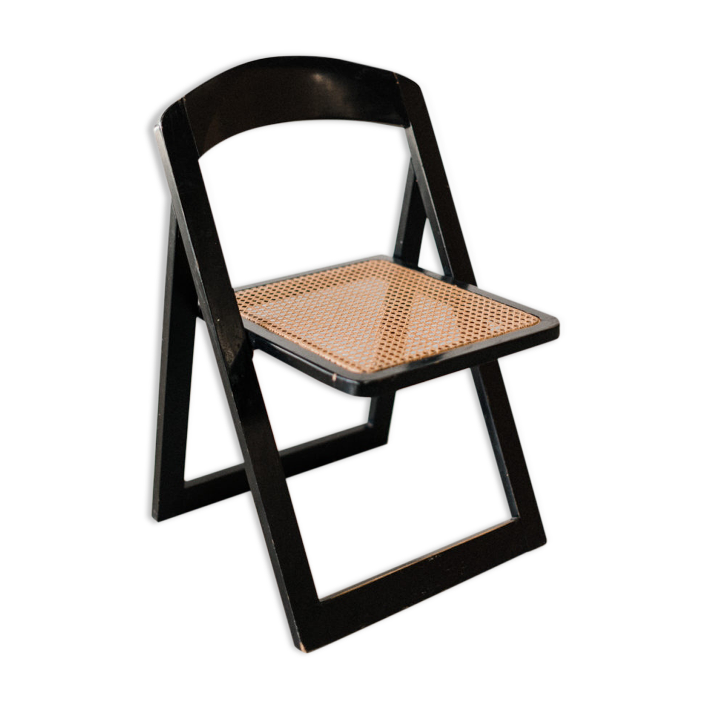 Folding black cannage chair