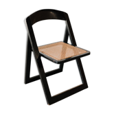 Folding black cannage chair