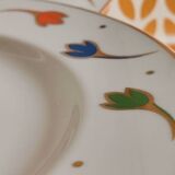 Set of porcelain plates with a frieze from Royal Limoges.