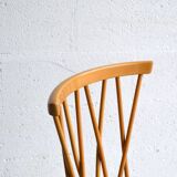 Series of four “candlestick” chairs by Lucian Ercolani