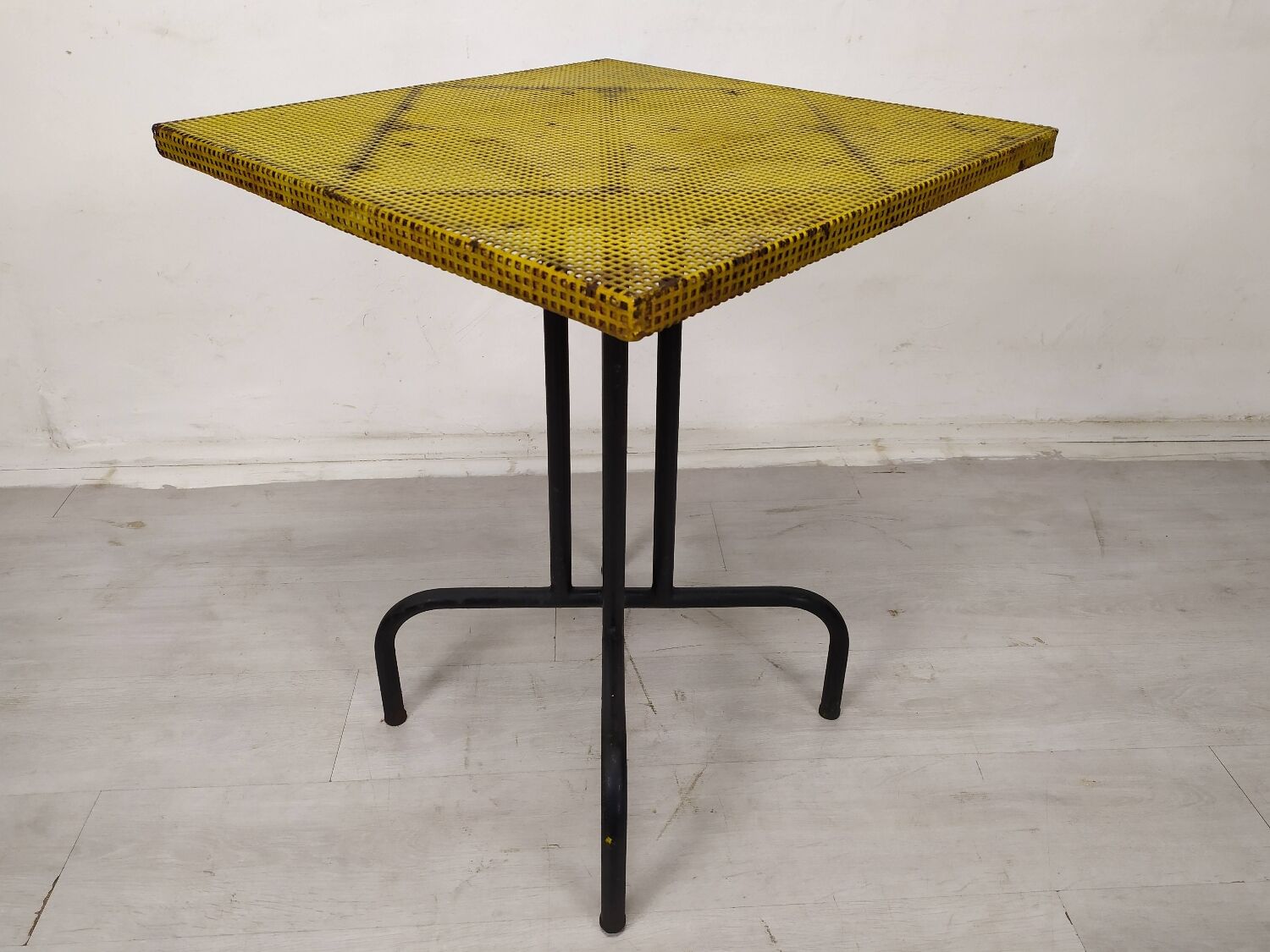 Vintage perforated metal bistro table