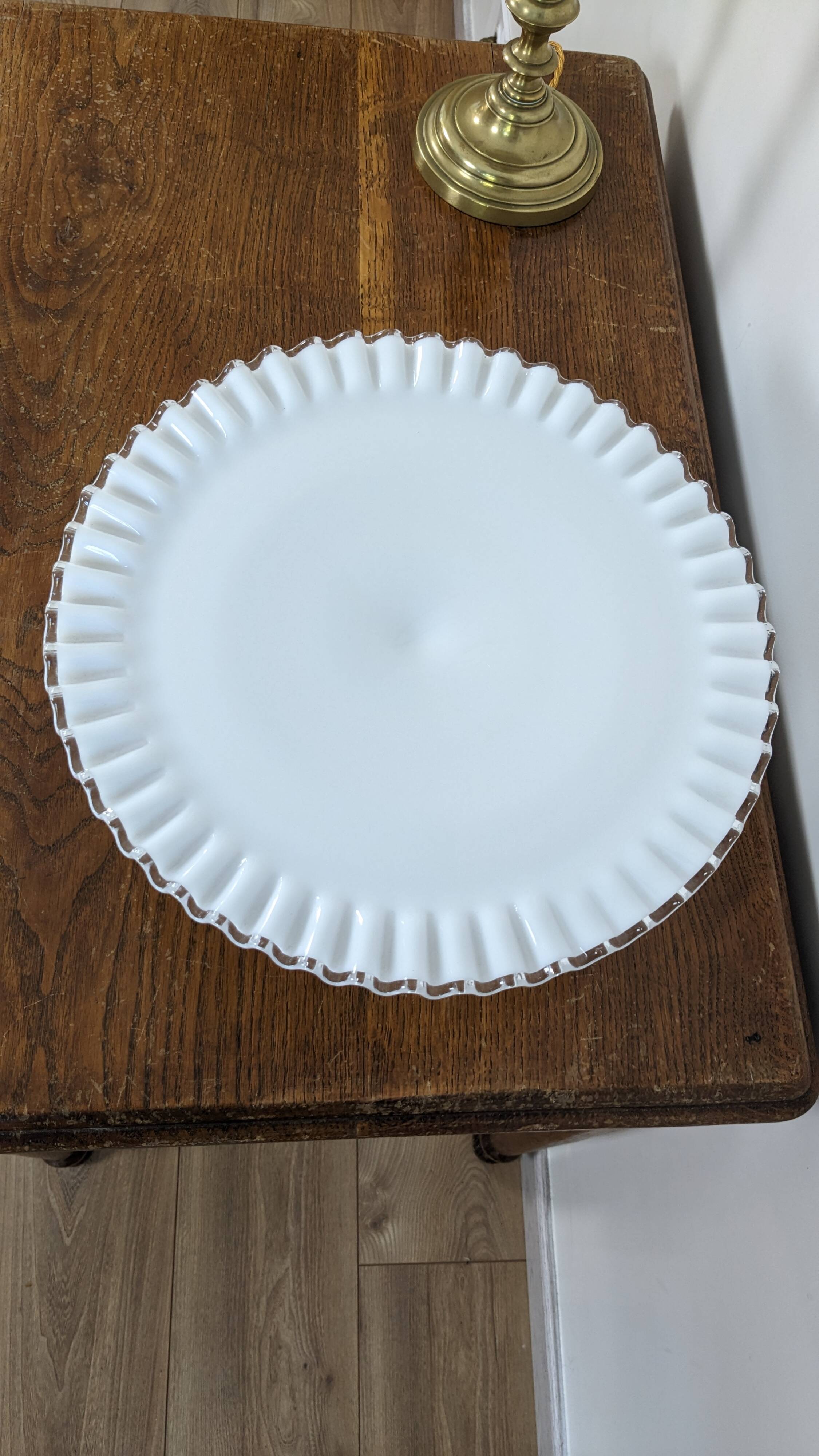 Antique white opal glass display stand with serrated edges