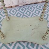 Shelf coils monogrammed patinated wood