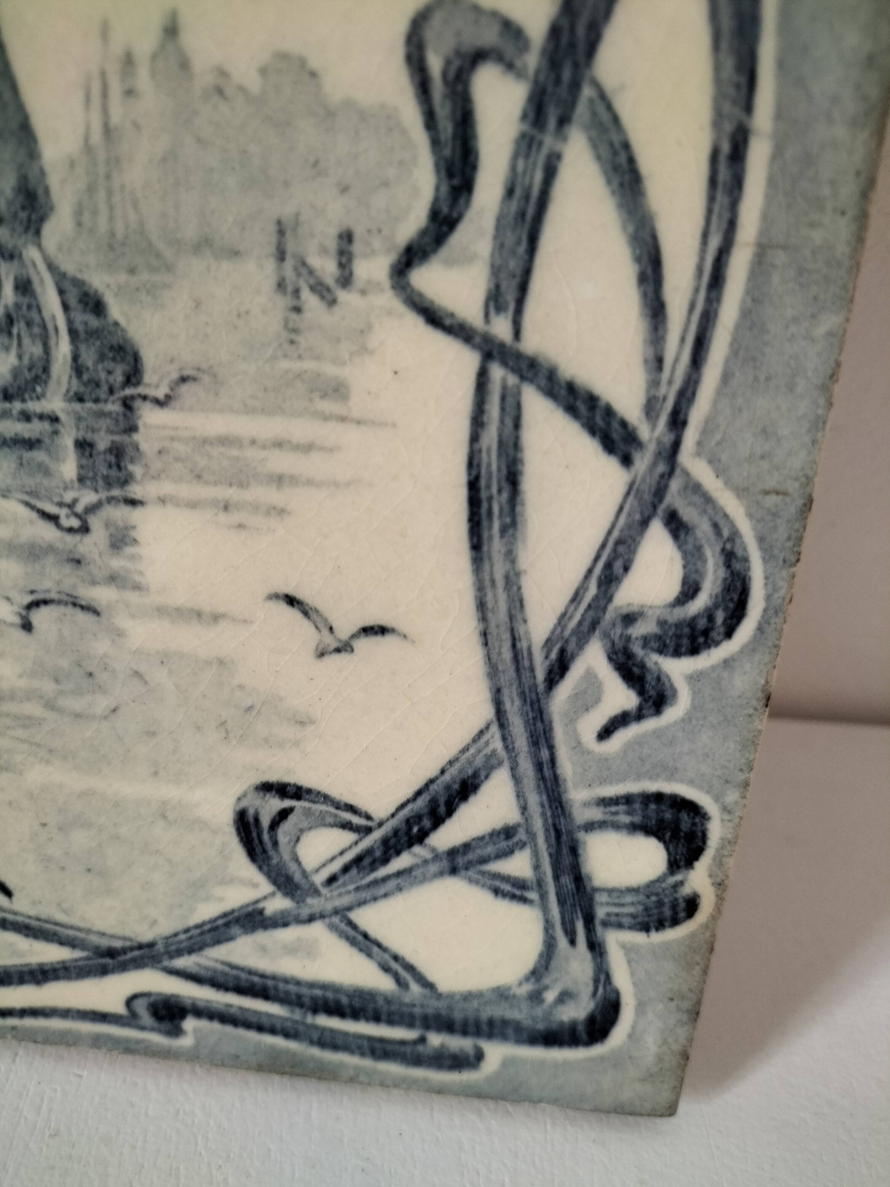 Old tile in Gien faience with Art Nouveau decoration