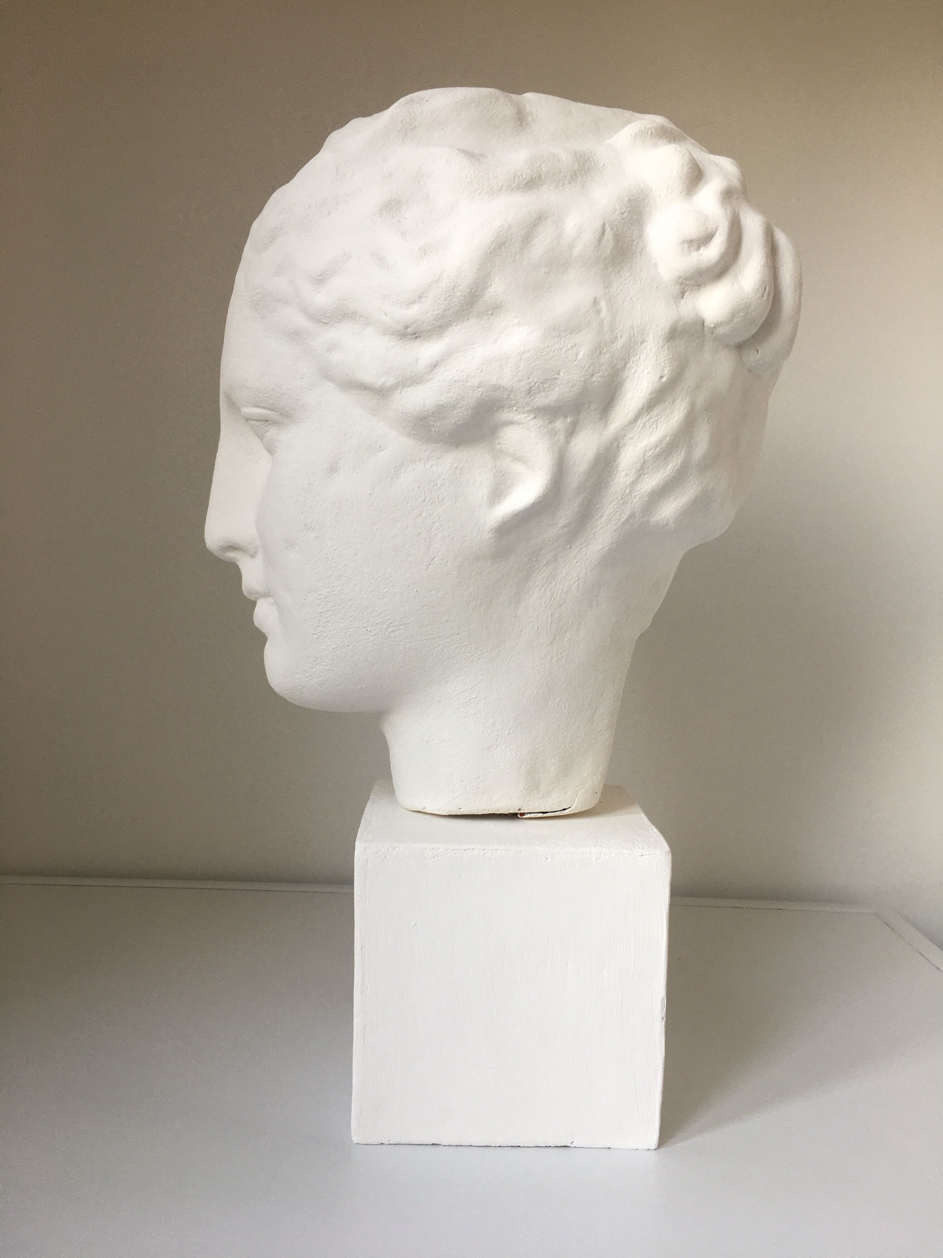 Greek Ap Hygie head. Scopas Hellenistic Greek art in plaster-bleached terracotta