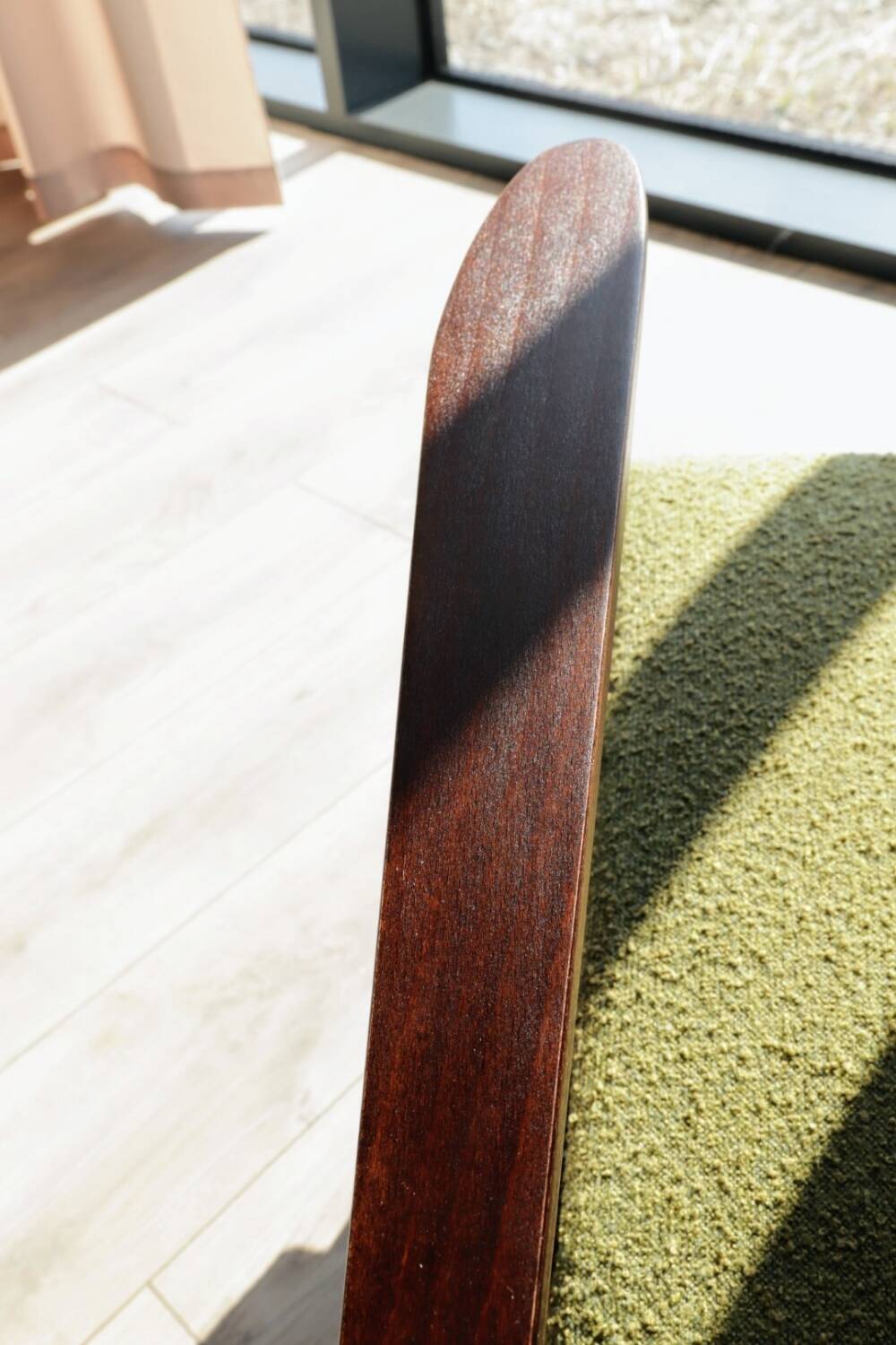 Vintage armchair in moss green bouclé design by H. Lis.