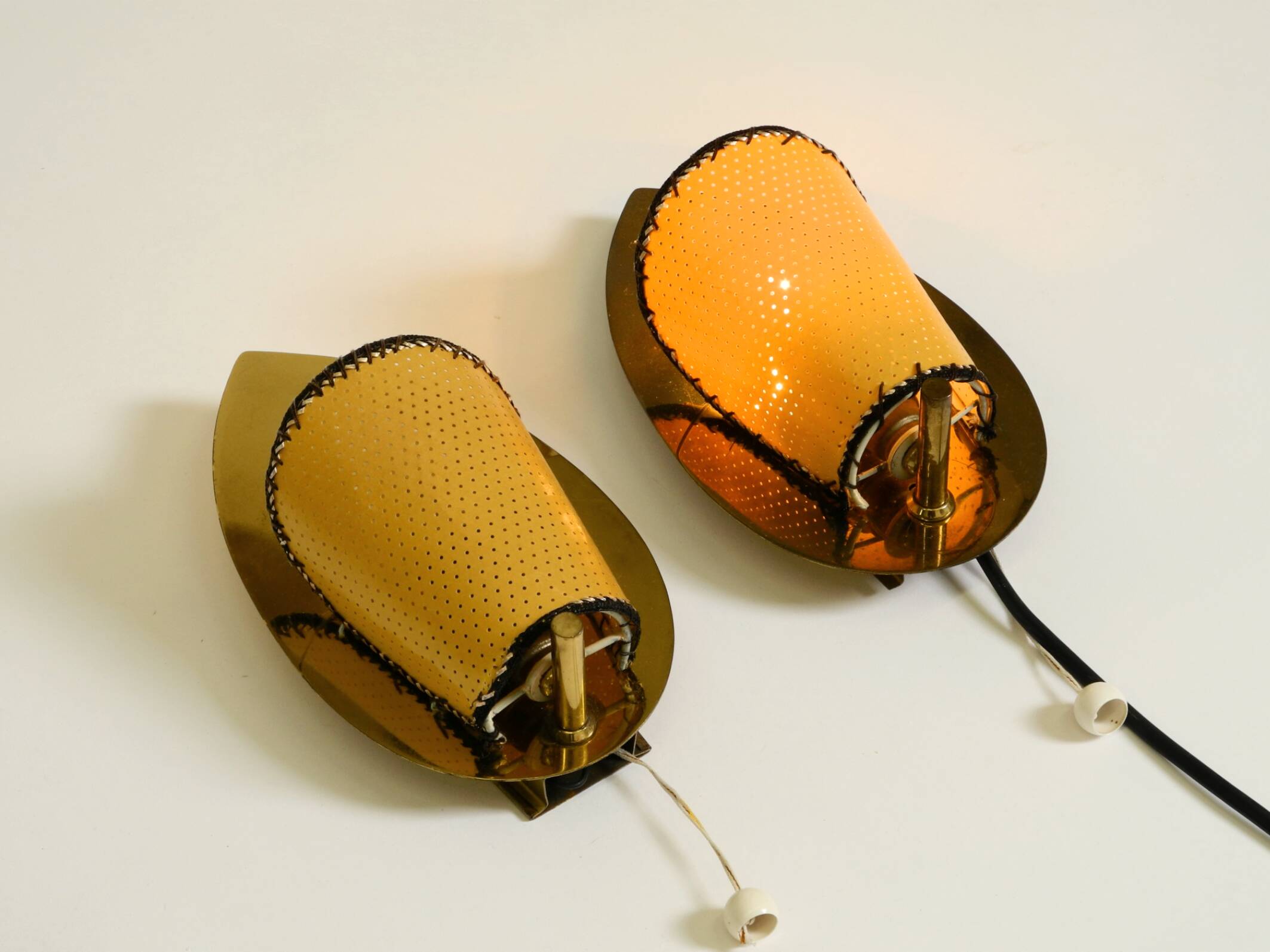 Two enchanting original Mid Century Modern brass wall lamps
