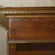Pair of Sheraton Revival bookcases in satinwood, walnut, and yew.