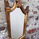 Miroir style art déco en bois sculpté avec dorure, 1950