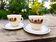 Two vintage opaline glass cups/saucers JAJ Pyrex England.